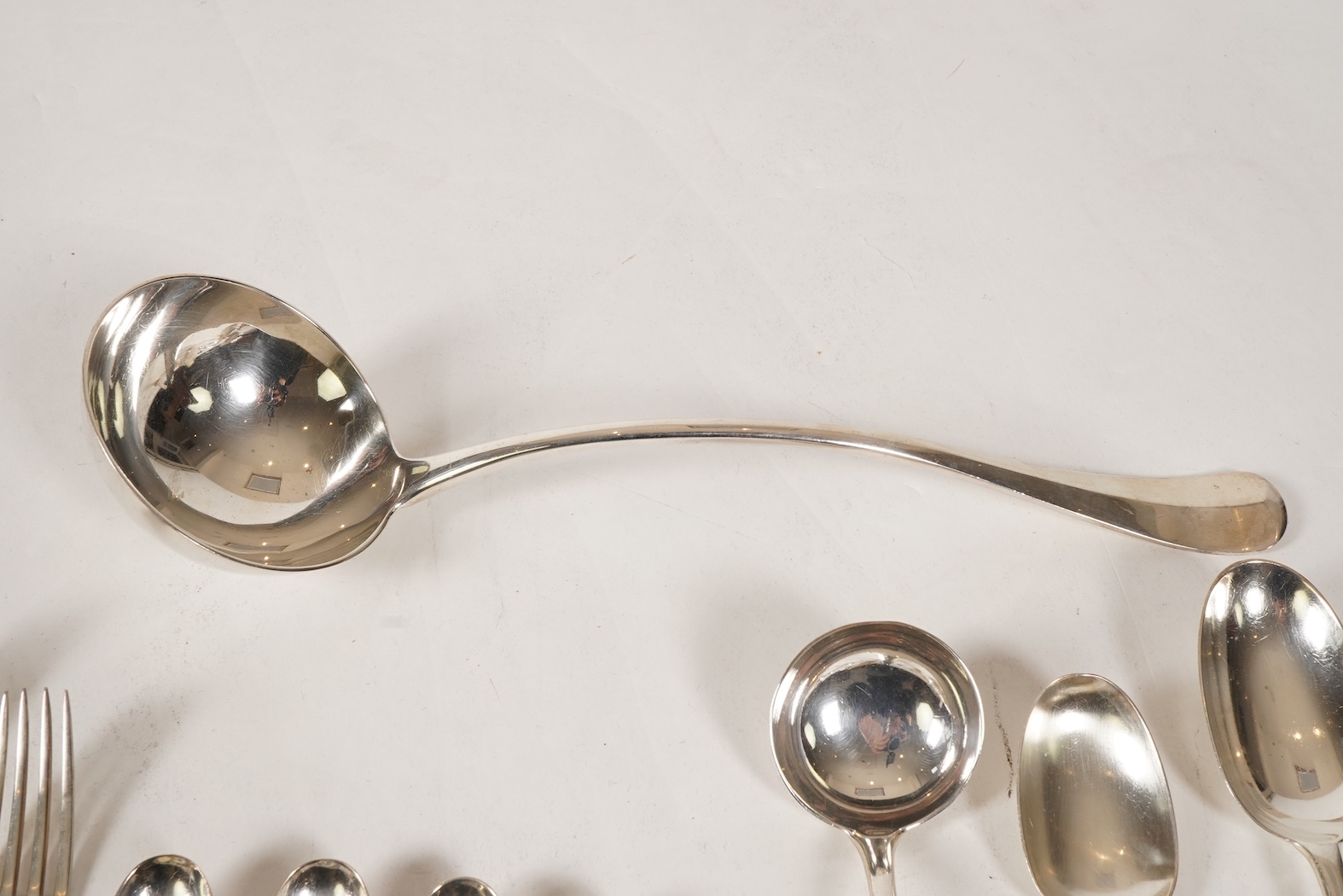 A George V canteen of silver Hanoverian rat tail flatware, by Mappin & Webb